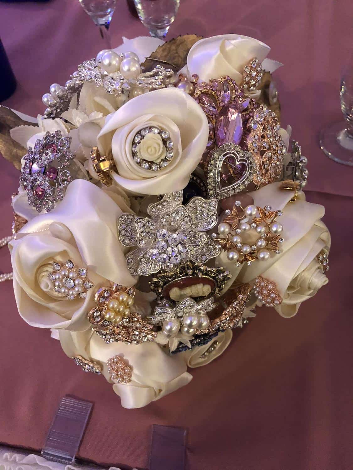 Beautiful jewelry bouquet with pearls and rhinestones for event decor.